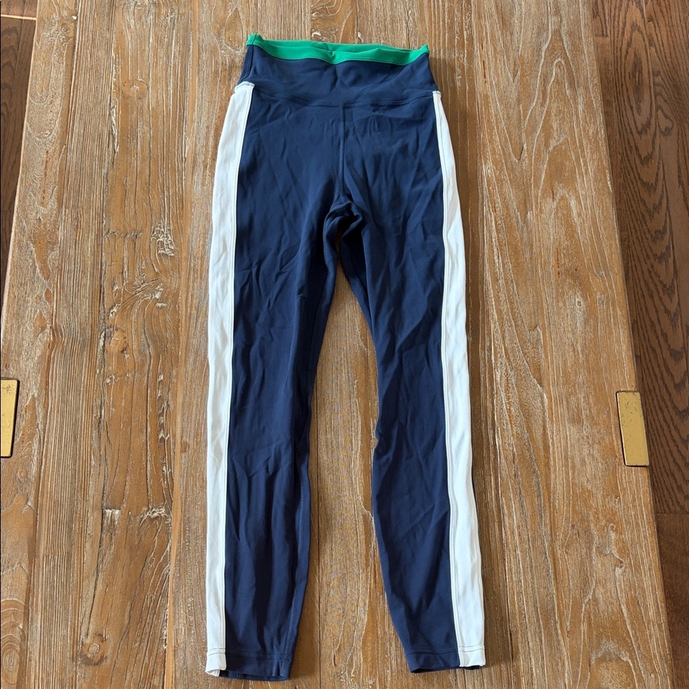 lululemon athletica Navy Leggings with White Side Stripes and Green Waistband